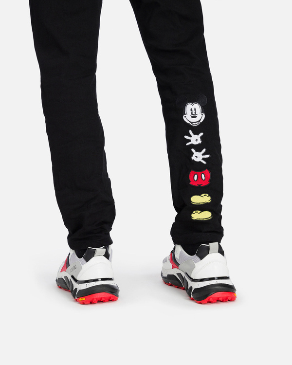 Black slim Iceberg jeans with deconstructed Mickey Mouse - Iceberg - Official Website