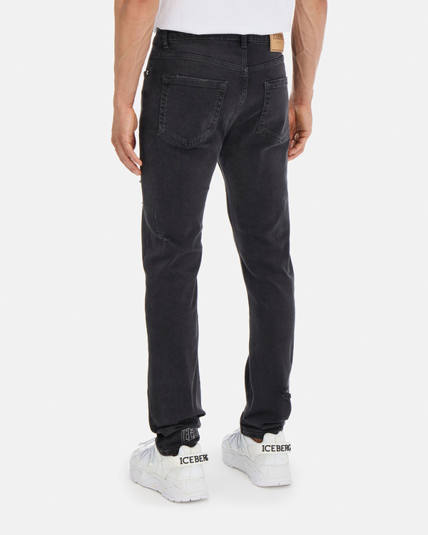 Men's black skinny fit jeans with tears and Peanuts graphics - Iceberg - Official Website