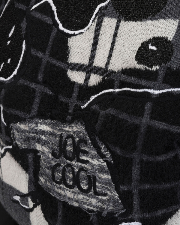 Piumino corto donna nero con ricamo Snoopy Joe Cool su sfondo pattern check sul retro - Iceberg - Official Website