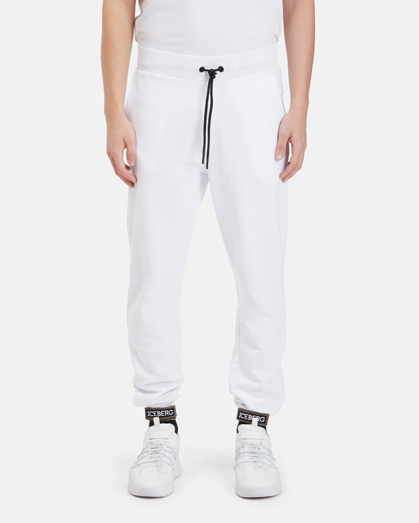 Pantaloni sportivi uomo bianchi con chiusura in velcro e fondo gamba con patch logato - Iceberg - Official Website