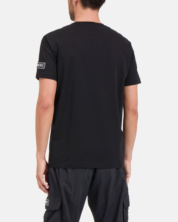 Men's black stretch cotton T-shirt with "Woodstock" print and logo - Iceberg - Official Website