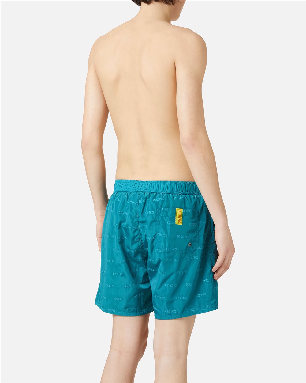 Teal-colored swim trunks with elastic and black drawstring and allover tone-on-tone Iceberg logo - Iceberg - Official Website