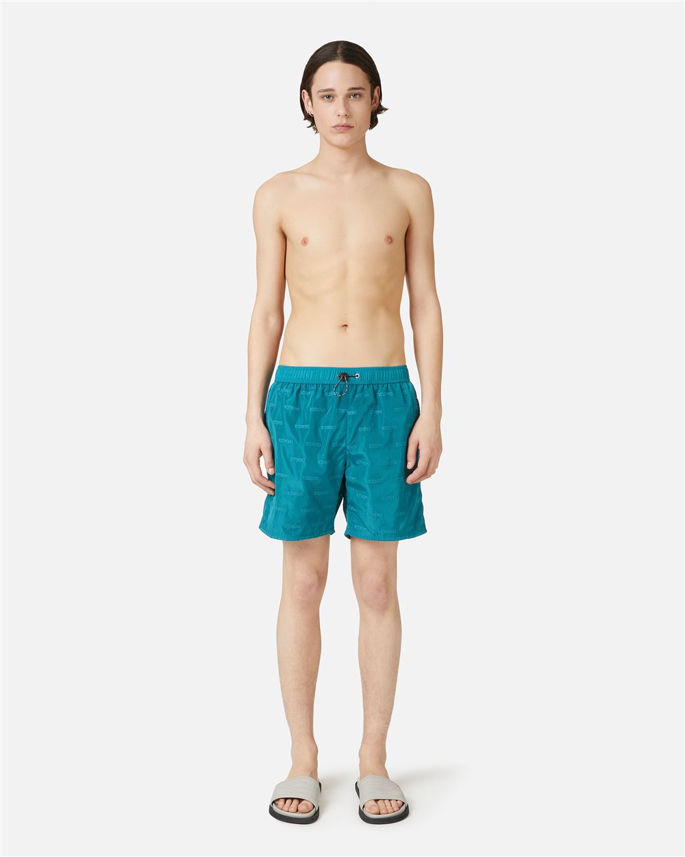 Teal-colored swim trunks with elastic and black drawstring and allover tone-on-tone Iceberg logo - Iceberg - Official Website