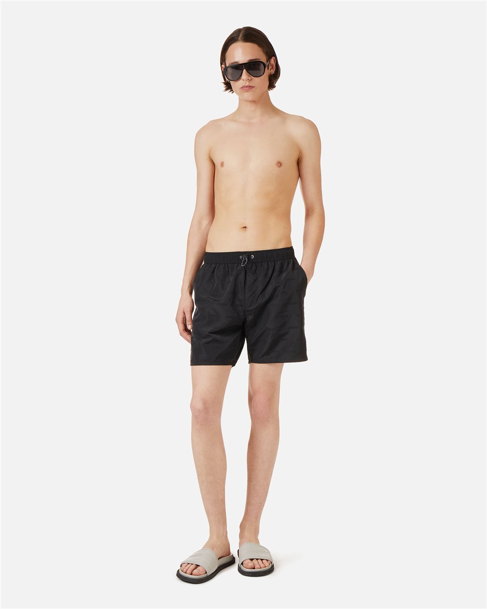 Black swim trunks with elastic and black drawstring and allover tone-on-tone Iceberg logo - Iceberg - Official Website
