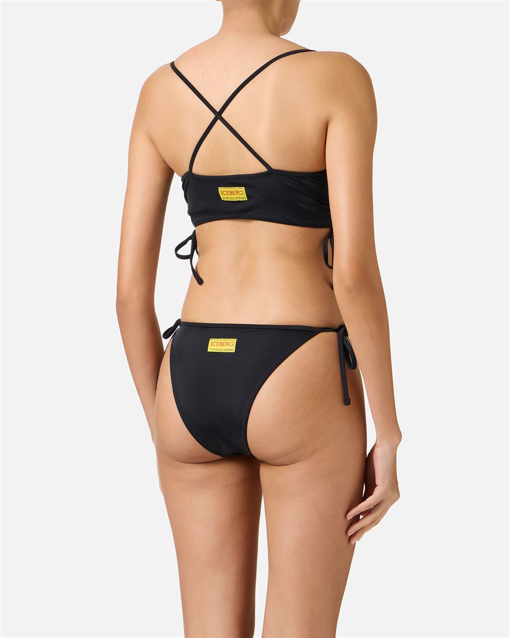 Top nero per costume da bagno a fascia con spalline e stampa Silvestro al centro - Iceberg - Official Website