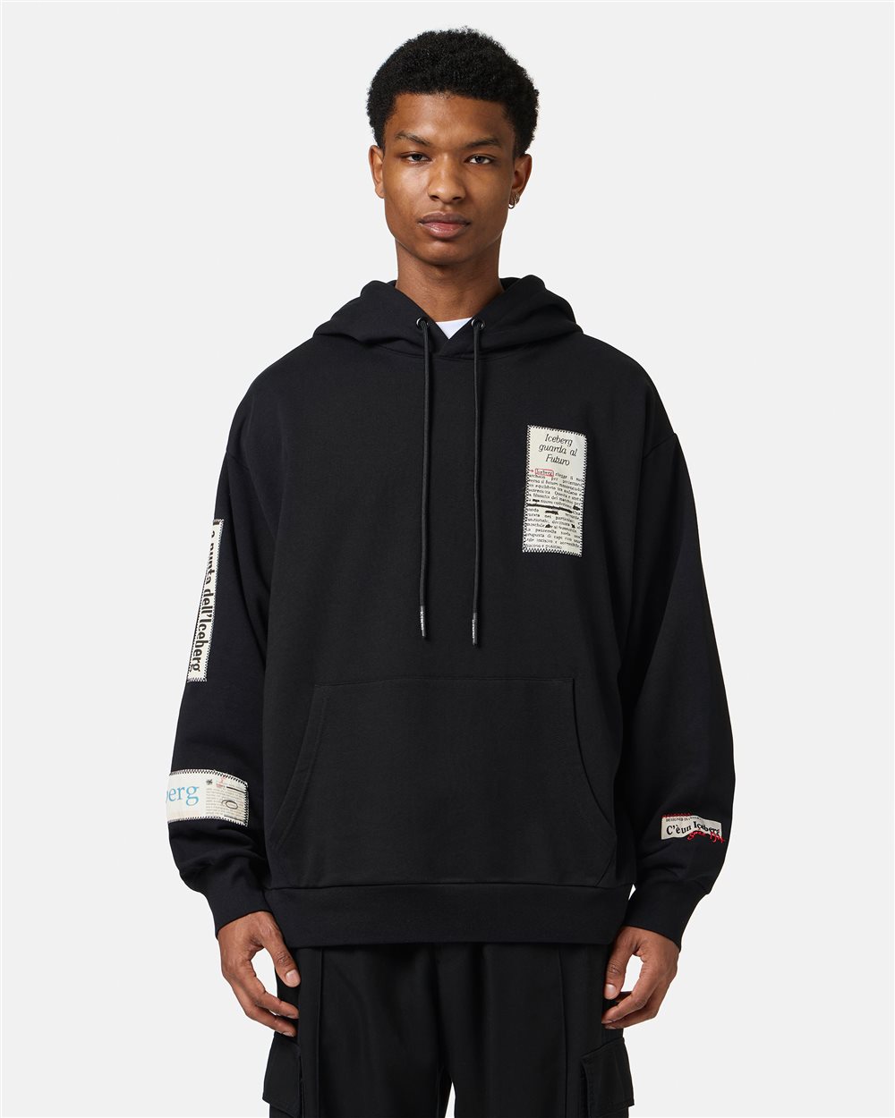 Black relaxed fit cotton hoodie with newspaper print - Iceberg - Official Website