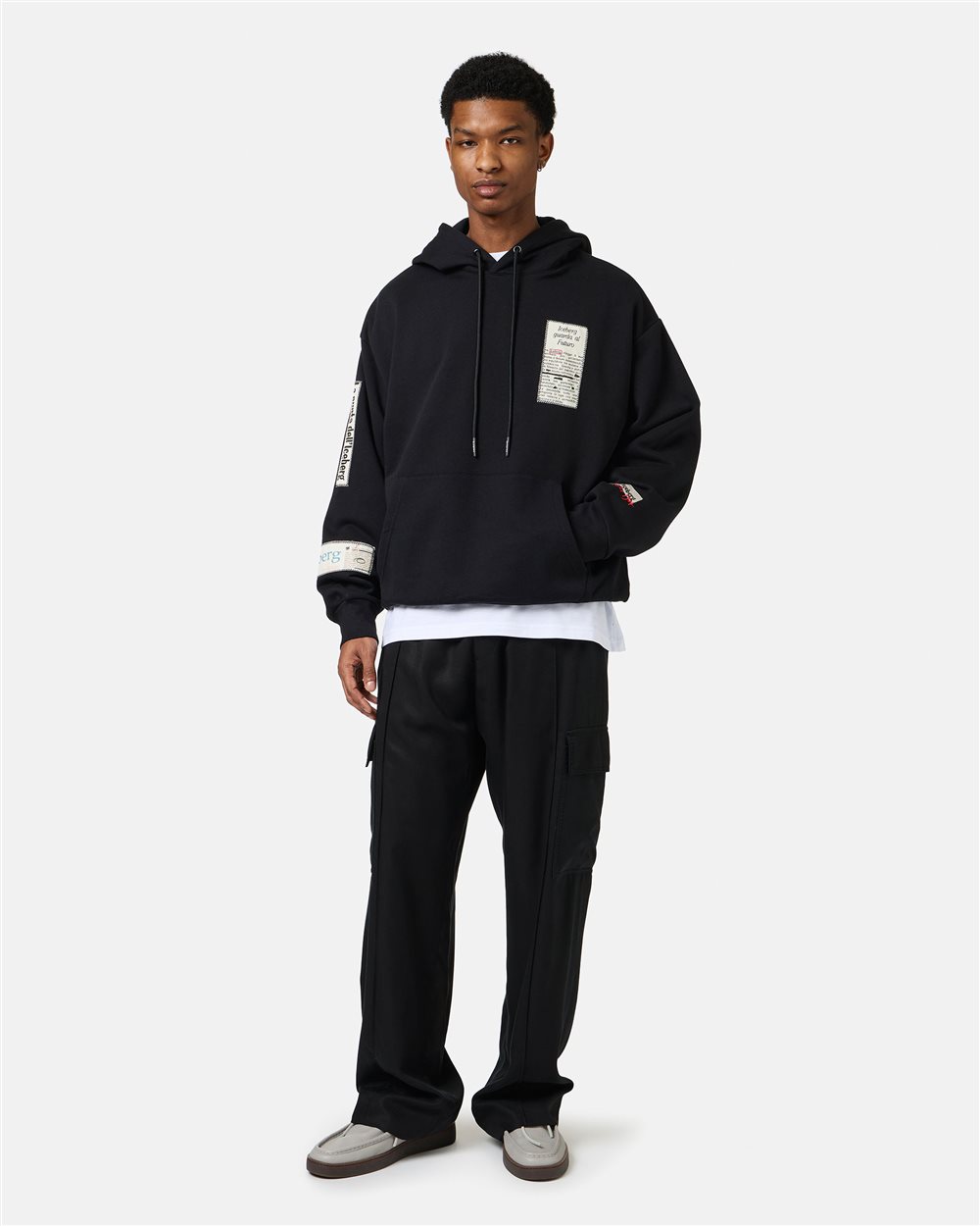 Black relaxed fit cotton hoodie with newspaper print - Iceberg - Official Website