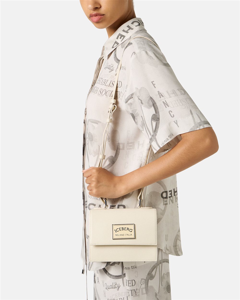 Mini top handle bag in powder-colored Saffiano leather - Iceberg - Official Website