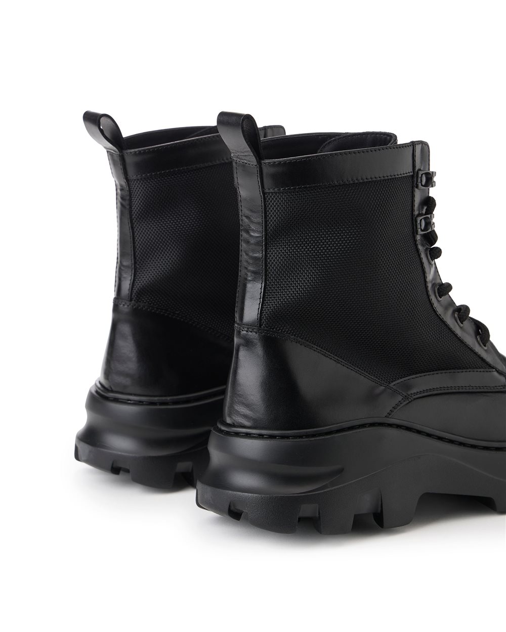 Leather thigh-high boots with XL grooved sole - Iceberg - Official Website