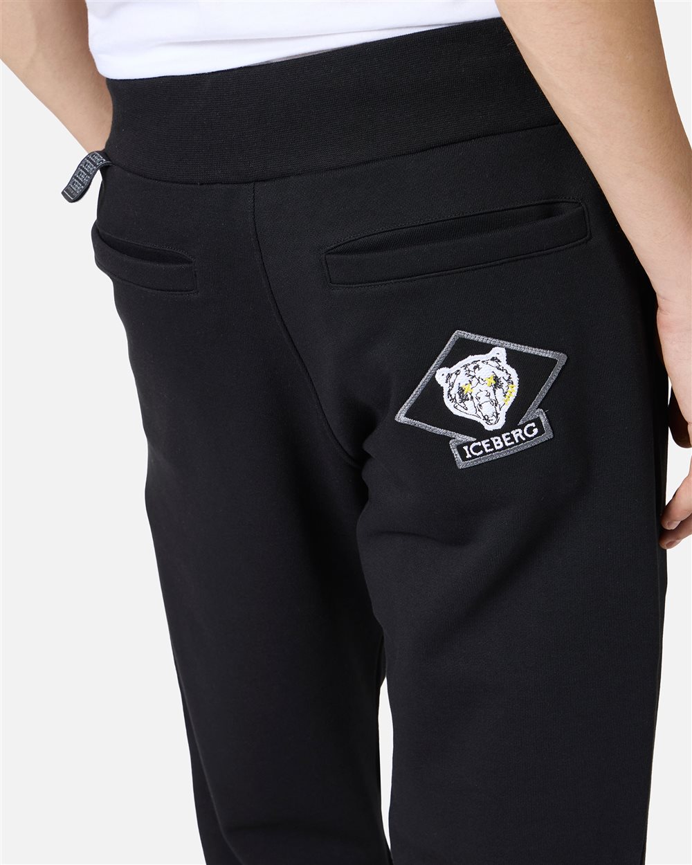 Regular fit trousers in black cotton fleece with embroidered bear patch - Iceberg - Official Website