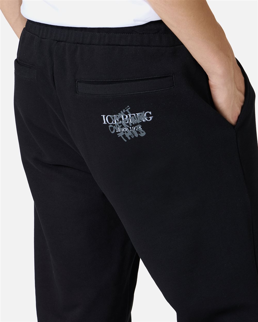 Straight leg fit trousers in black cotton fleece with "Dont Overthink This" print - Iceberg - Official Website