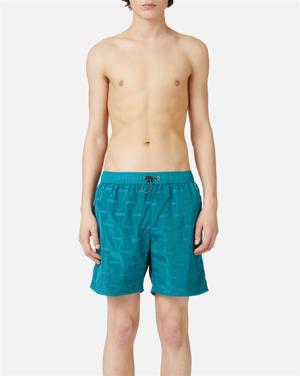 Teal-colored swim trunks with elastic and black drawstring and allover tone-on-tone Iceberg logo - Uomo | Iceberg - Official Website