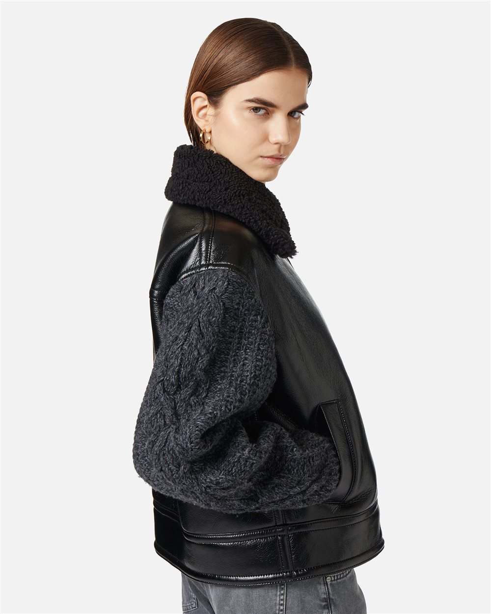 Black sheepskin and braided knit jacket with teddy bear details